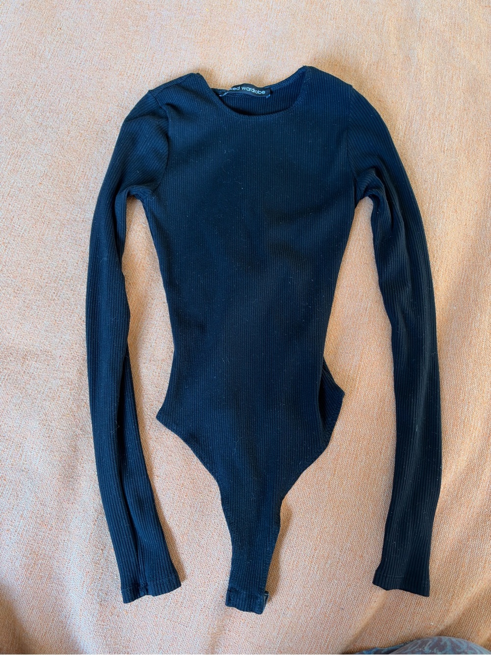 Black Ribbed Long-Sleeve One-Piece Bodysuit